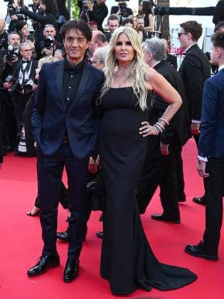 Cannes, France: Cannes, 78th Cannes Film Festival 2025 - evening 2 - Red Carpet of the film Mission Impossible - The Final Reckoning. In the photo: Tiziana Rocca and Giulio Base Cannes France  - ZUMAp169 20250514_zea_p169_591 Copyright: xManuelexMangiarottix