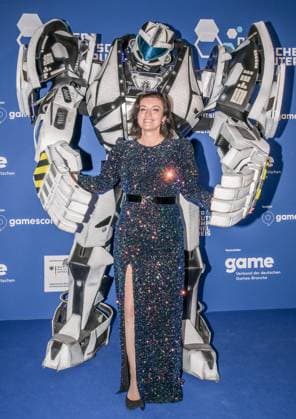 Entertainment, Presentation of the German Computer Game Award 2025 14 05 2025, xdanx, Entertainment, Presentation of the German Computer Game Award 2025 emspor, v l Gamescom Bot with Federal Minister of Research, Technology and Space Dorothee Baer at the presentation of the German Computer Game Award 2025 at the Funkturm Berlin Berlin Palais am Funkturm Berlin Germa Copyright: xDanielxLakomskix