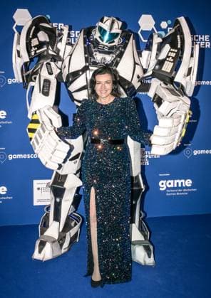Entertainment, Presentation of the German Computer Game Award 2025 14 05 2025, xdanx, Entertainment, Presentation of the German Computer Game Award 2025 emspor, v l Gamescom Bot with Federal Minister of Research, Technology and Space Dorothee Baer at the presentation of the German Computer Game Award 2025 at the Funkturm Berlin Berlin Palais am Funkturm Berlin Germa Copyright: xDanielxLakomskix
