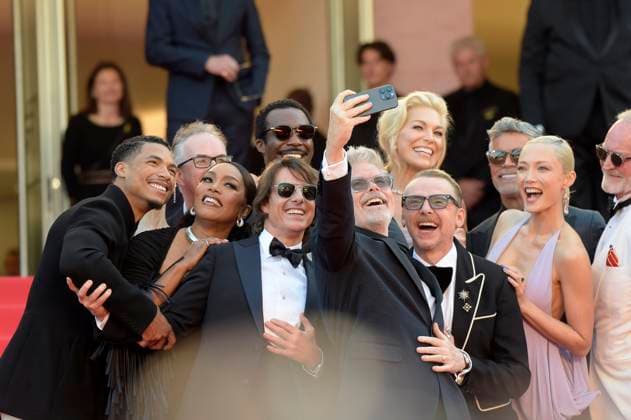 French actress Pom Klementieff, American actress Angela Bassett, actors Tom Cruise, Greg Tarzan Davis, Tarmell Tillman, Esai Morales, director Christopher McQuarrie, British actor Simon Pegg, actresses Hayley Atwell and Hannah Waddingham enjoy a selfie as they attend the premiere of Mission: Impossible- The Final Reckoning at the 78th Cannes Film Festival in Cannes, France on Wednesday May 14, 2025.  CAN2025051452 RoccoxSpaziani