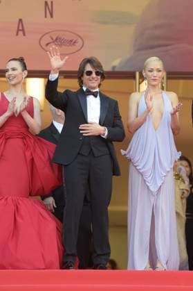 American actor Tom Cruise and French actress Pom Klementieff attend the premiere of Mission: Impossible- The Final Reckoning at the 78th Cannes Film Festival in Cannes, France on Wednesday May 14, 2025.  CAN2025051453 RoccoxSpaziani