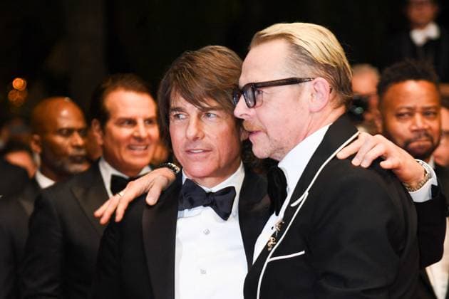 Cannes Exit Mission Impossible The Final Reckoning Screening AM Tom Cruise and Simon Pegg attending the Mission: Impossible - The Final Reckoning red carpet for the Out of Competition premiere, Cannes, France on May 14, 2025 as part of the 78th Cannes Film Festival. Photo by Aurore Marechal ABACAPRESS.COM Cannes France  Copyright: xMarechalxAurore ABACAx