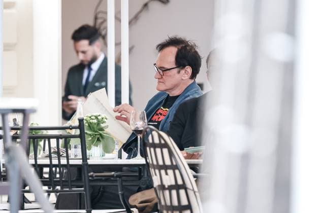 Cannes, Celebrity Sightings During Cannes Film Festival 78, Quentin Tarantino Reads a Script During Lunch at the Hotel Carlton. In the photo: Quentin Tarantino (American Director)  Copyright: xAlessandroxBremecx xipa-agency.netx xx IPA_Agency_IPA57723260