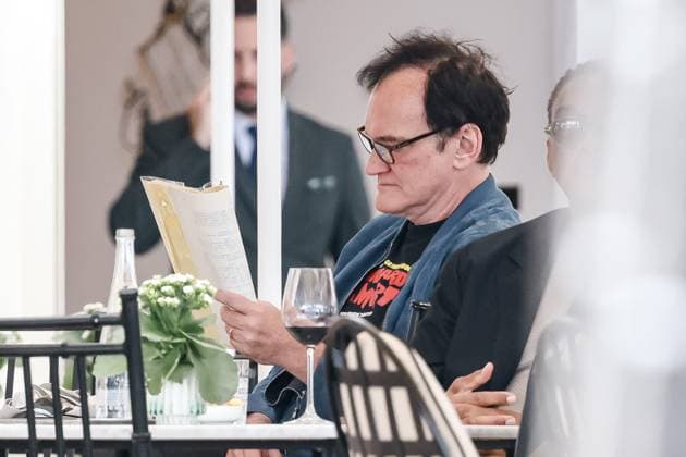 Entertainment Bilder des Tages Cannes, Celebrity Sightings During Cannes Film Festival 78, Quentin Tarantino Reads a Script During Lunch at the Hotel Carlton. In the photo: Quentin Tarantino (American Director)  Copyright: xAlessandroxBremecx xipa-agency.netx xx IPA_Agency_IPA57723282