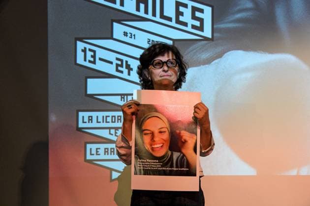 Cannes - Screening Put Your Soul on Your Hand and Walk French Iranian Sepideh Farsi reacts with a photo of killed Palestinian photographer Fatma Hassona, killed in an Israeli attack on her house, at the end of the screening of her movie ‘Put Your Soul on Your Hand and Walk’, as part of ACID competition, at the 78th annual Cannes Film Festival, in Cannes, France, on May 15, 2025. Photo by Ammar Abd Rabbo ABACAPRESS.COM Cannes France  Copyright: xAbdxRabboxAmmar ABACAx