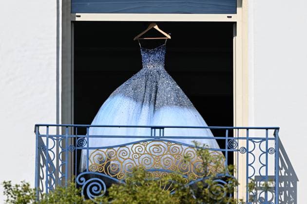 Cannes - Blue Dress On Hotel Martinez Balcony Illustration of a stunning blue dress, just minutes before a photo shoot on the balcony of the Martinez in Cannes, France on May 15, 2025. Photo by Florian Poitout ABACAPRESS.COM Cannes France  Copyright: xPoitoutxFlorian ABACAx