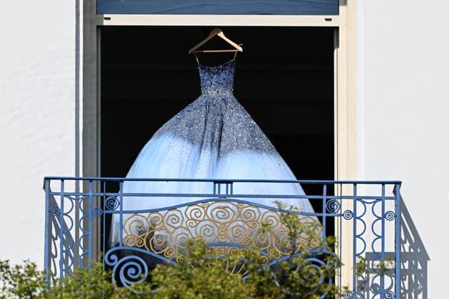 Cannes - Blue Dress On Hotel Martinez Balcony Illustration of a stunning blue dress, just minutes before a photo shoot on the balcony of the Martinez in Cannes, France on May 15, 2025. Photo by Florian Poitout ABACAPRESS.COM Cannes France  Copyright: xPoitoutxFlorian ABACAx