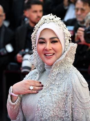 Cannes, 78th Cannes Film Festival 2025 - evening 3 - red carpet of the film Dossier 137 Cannes, 78th Cannes Film Festival 2025 - evening 3 - red carpet of the film Dossier 137 (Case 137) - In the photo: Syahrini cannes France  Copyright: xIPA ABACAx