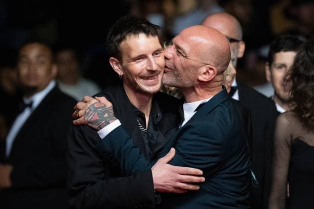 Cannes Sirat Premiere AM Richard Bellamy and guest attending the the Sirat red carpet in Cannes, France on May 15, 2025 as part of the 78th Cannes Film Festival. Photo by Aurore Marechal ABACAPRESS.COM Cannes France  Copyright: xMarechalxAurore ABACAx