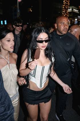 Cannes, Celebrity Sightings During Cannes Film Festival 78, Charli XCX Eats Ice Cream While Walking Down The Croisette On Her Way To The Magnum Party Cannes, Celebrity Sightings During Cannes Film Festival 78, Charli XCX Eats Ice Cream While Walking Down The Croisette On Her Way To Party Magnum. In The Photo: Charli XCX (British Singer) Milan Italy  Copyright: xIPA ABACAx