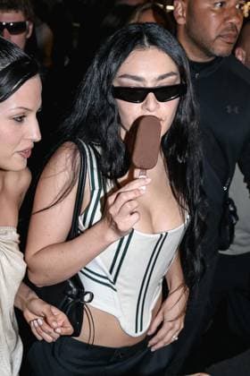Cannes, Celebrity Sightings During Cannes Film Festival 78, Charli XCX Eats Ice Cream While Walking Down The Croisette On Her Way To The Magnum Party Cannes, Celebrity Sightings During Cannes Film Festival 78, Charli XCX Eats Ice Cream While Walking Down The Croisette On Her Way To Party Magnum. In The Photo: Charli XCX (British Singer) Milan Italy  Copyright: xIPA ABACAx