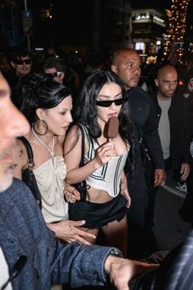 Cannes, Celebrity Sightings During Cannes Film Festival 78, Charli XCX Eats Ice Cream While Walking Down The Croisette On Her Way To The Magnum Party Cannes, Celebrity Sightings During Cannes Film Festival 78, Charli XCX Eats Ice Cream While Walking Down The Croisette On Her Way To Party Magnum. In The Photo: Charli XCX (British Singer) Milan Italy  Copyright: xIPA ABACAx