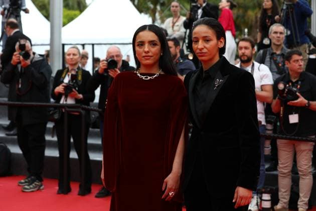 May 16, 2025, Cannes, Cote D azur, France: Director HAFSIA HERZI hugs actress NADIA MELLITI on the red carpet for the La Petite Derniere Premiere screening at the 78th Annual Cannes Film Festival at Palais des Festivals in Cannes, France Cannes France - ZUMAc179 20250516_zep_c179_212 Copyright: xMickaelxChavetx
