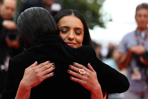 May 16, 2025, Cannes, Cote D azur, France: Director HAFSIA HERZI hugs actress NADIA MELLITI on the red carpet for the La Petite Derniere Premiere screening at the 78th Annual Cannes Film Festival at Palais des Festivals in Cannes, France Cannes France - ZUMAc179 20250516_zep_c179_216 Copyright: xMickaelxChavetx