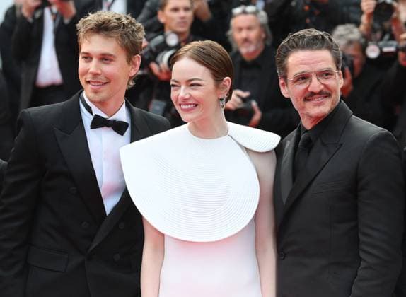 Chilean- American actor Pedro Pascal, American actress Emma Stone and actor Austin Butler attend the premiere of Eddington at the 78th Cannes Film Festival in Cannes, France on Friday May 16, 2025.  CAN20250516175 RUNExHELLESTAD