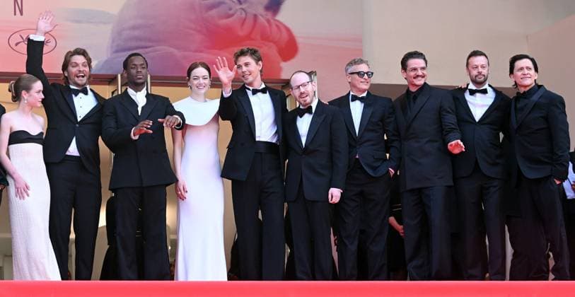 British actor Michael Ward, Chilean- American actor Pedro Pascal, American actress Emma Stone, actors Luke Grimes, Joaquin Phoenix, Clifton Collins Jr, Austin Butler, director Ari Aster and Danish producer Lars Knudsen attend the premiere of Eddington at the 78th Cannes Film Festival in Cannes, France on Friday May 16, 2025.  CAN20250516184 RUNExHELLESTAD