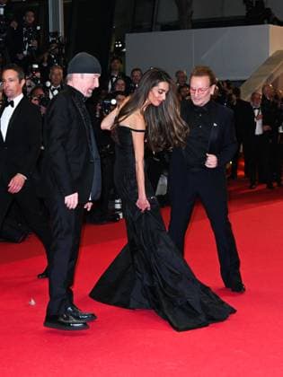 Cannes, 78th Cannes Film Festival 2025 - Evening 4 - Red Carpet of the Film Bono: Stories of Surrender Cannes, 78th Cannes Film Festival 2025 - Evening 4 - Red Carpet of the Film Bono: Stories of Surrender . In the Photo The Edge Amal Clooney Bono Cannes France  Copyright: xIPA ABACAx
