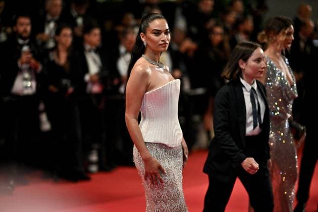 Cannes Bono Stories Of Surrender Screening JR Shanina Shaik attending the screening of Bono Stories Of Surrender in Cannes, France on May 16, 2025, as part of the 78th Cannes Film Festival. Photo by Julien Reynaud APS-Medias ABACAPRESS.COM Cannes France  Copyright: xReynaudxJulien APS-Medias ABACAx