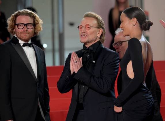 Bono - Stories of Surrender Premiere at 78th Festival de Cannes - Cannes, France CANNES, FRANCE. May 16, 2025: Erik Messerschmidt, Bono & Kelly McNamara at the premiere for Bono - Stories of Surrender at the 78th Festival de Cannes. Picture: Paul Smith Featureflash Cannes France  Copyright: xPaulxSmithx xFeatureflashx