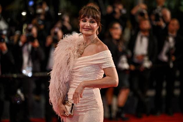 Cannes Bono Stories Of Surrender Screening JR Helena Christensen attending the screening of Bono Stories Of Surrender in Cannes, France on May 16, 2025, as part of the 78th Cannes Film Festival. Photo by Julien Reynaud APS-Medias ABACAPRESS.COM Cannes France  Copyright: xReynaudxJulien APS-Medias ABACAx