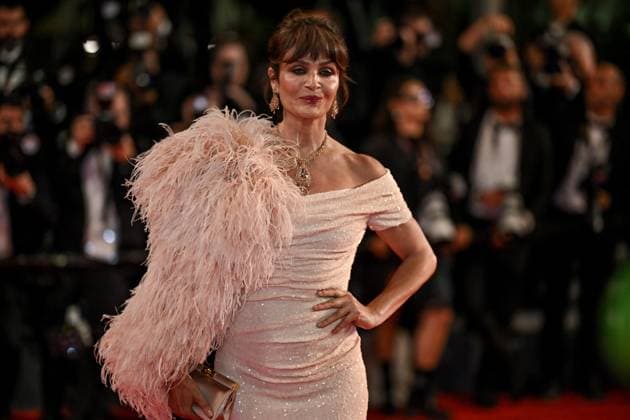 Cannes Bono Stories Of Surrender Screening JR Helena Christensen attending the screening of Bono Stories Of Surrender in Cannes, France on May 16, 2025, as part of the 78th Cannes Film Festival. Photo by Julien Reynaud APS-Medias ABACAPRESS.COM Cannes France  Copyright: xReynaudxJulien APS-Medias ABACAx