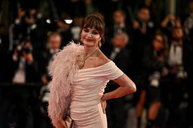 Cannes Bono Stories Of Surrender Screening JR Helena Christensen attending the screening of Bono Stories Of Surrender in Cannes, France on May 16, 2025, as part of the 78th Cannes Film Festival. Photo by Julien Reynaud APS-Medias ABACAPRESS.COM Cannes France  Copyright: xReynaudxJulien APS-Medias ABACAx