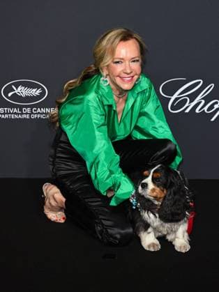 Cannes, 78th Cannes Film Festival 2025 - Evening 4 - Chopard Gala Cannes, 78th Cannes Film Festival 2025 - Evening 4 - Chopard Gala - In the photo: Caroline Scheufele WITH HER DOG cannes France  Copyright: xIPA ABACAx