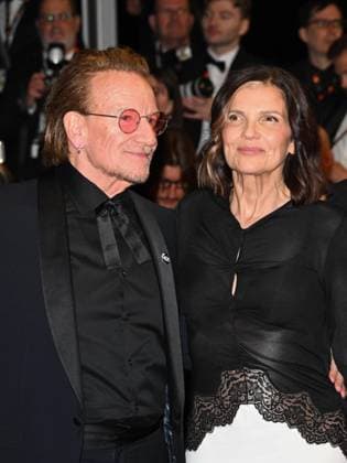 Cannes, 78th Cannes Film Festival 2025 - Evening 4 - Red Carpet of the Film Bono: Stories of Surrender Cannes, 78th Cannes Film Festival 2025 - Evening 4 - Red Carpet of the Film Bono: Stories of Surrender . In the Photo Bono Vox with his wife Ali Hewson Cannes France  Copyright: xIPA ABACAx
