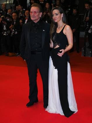 Cannes, 78th Cannes Film Festival 2025 - Evening 4 - Red Carpet of the Film Bono: Stories of Surrender Cannes, 78th Cannes Film Festival 2025 - Evening 4 - Red Carpet of the Film Bono: Stories of Surrender . In the Photo Bono Vox with his daughter Eve Hewson Cannes France  Copyright: xIPA ABACAx