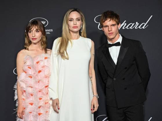 Cannes, 78th Cannes Film Festival 2025 - Evening 4 - Chopard Gala Cannes, 78th Cannes Film Festival 2025 - Evening 4 - Chopard Gala - Pictured: Marie Colomb, Angelina Jolie, Finn Bennett cannes France  Copyright: xIPA ABACAx