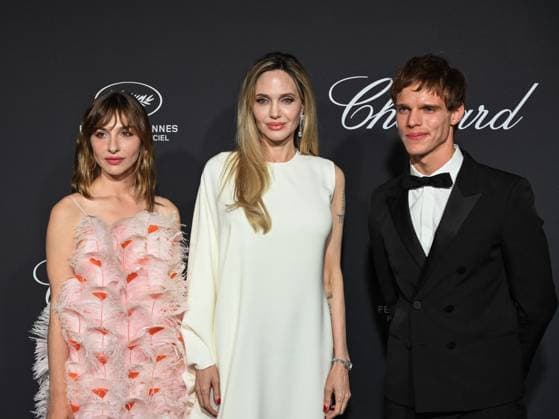 Cannes, 78th Cannes Film Festival 2025 - Evening 4 - Chopard Gala Cannes, 78th Cannes Film Festival 2025 - Evening 4 - Chopard Gala - Pictured: Marie Colomb, Angelina Jolie, Finn Bennett cannes France  Copyright: xIPA ABACAx