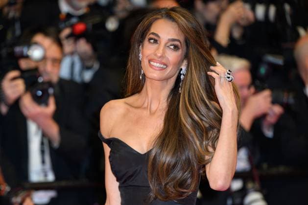 Cannes Bono Stories of Surrender Red Carpet NG Amal Clooney attending the ‘Bono Stories of Surrender’ Screening and Red Carpet at Palais Des Festivals in Cannes, France on May 16 2025 as part of the 78th Cannes Film Festival. Photo by Nicolas Genin ABACAPRESS.COM Cannes France  Copyright: xGeninxNicolas ABACAx