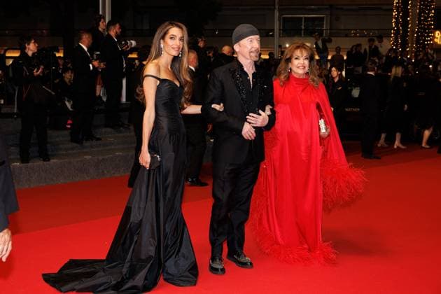 M Descente des marches du film Bono Stories of Surrender lors du 78ème Festival International du Film de Cannes The Edge surrounded by Amal Clooney Amal Alamuddin et de sa mère Baria Alamuddin Descente des marches du film Bono Stories of Surrender lors du 78ème Festival International du Film de Cannes, au Palais des Festivals in Cannes On may 16th 2025 Jacovides Moreau Bestimage People leaving the red carpet for the movie Bono Stories of Surrender during the 78th Cannes International Film Festival at the Palais des Festivals in Cannes, France On may 16th 2025 Cannes France  Copyright: xJACOVIDES-MOREAUx xBESTIMAGExJACOVIDES-MOREAUx xBESTIMAGEx