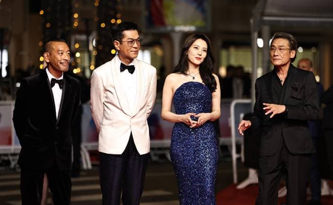 (250517) -- CANNES, May 17, 2025 -- Main cast members Tony Leung Ka Fai, Gao Yuanyuan, Louis Koo and director, screenwriter and producer Juno Mak (R-L), arrive for the premiere of the film Fung Lam Fo Saan (Sons of the Neon Night) at the 78th edition of the Cannes Film Festival in Cannes, southern France, on May 16, 2025. ) FRANCE-CANNES-FILM FESTIVAL- FUNG LAM FO SAAN -PREMIERE GaoxJing 