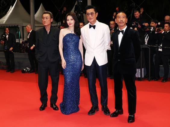 (250517) -- CANNES, May 17, 2025 -- Main cast members Tony Leung Ka Fai, Gao Yuanyuan, Louis Koo and director, screenwriter and producer Juno Mak (L-R), arrive for the premiere of the film Fung Lam Fo Saan (Sons of the Neon Night) at the 78th edition of the Cannes Film Festival in Cannes, southern France, on May 16, 2025. ) FRANCE-CANNES-FILM FESTIVAL- FUNG LAM FO SAAN -PREMIERE GaoxJing 