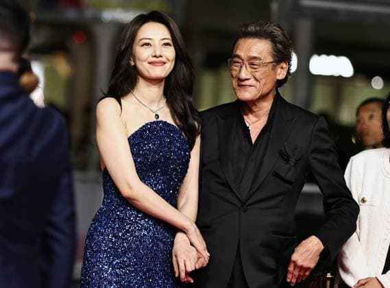 (250517) -- CANNES, May 17, 2025 -- Main cast members Gao Yuanyuan (L) and Tony Leung Ka Fai arrive for the premiere of the film Fung Lam Fo Saan (Sons of the Neon Night) at the 78th edition of the Cannes Film Festival in Cannes, southern France, on May 16, 2025. ) FRANCE-CANNES-FILM FESTIVAL- FUNG LAM FO SAAN -PREMIERE GaoxJing 