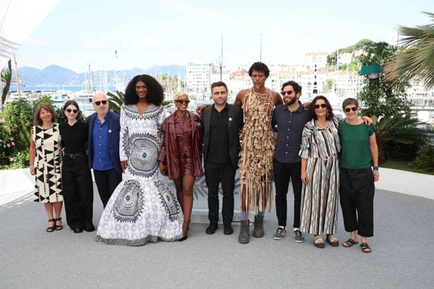 O Riso E A Faca (I Only Rest In The Storm) Photocall - The 78th Annual Cannes Film Festival Tatiana Leite, a guest, Tiago Hespanha, Cleo Diara, Pedro Pinho, Jonathan Guilherme, SÃ rgio Coragem, Filipa Reis and Juliette Lepoutre - O Riso E A Faca (I Only Rest In The Storm) Photocall - The 78th Annual Cannes Film Festival in Cannes, France on May 18, 2025.  Copyright: x Chassery+Courdjix