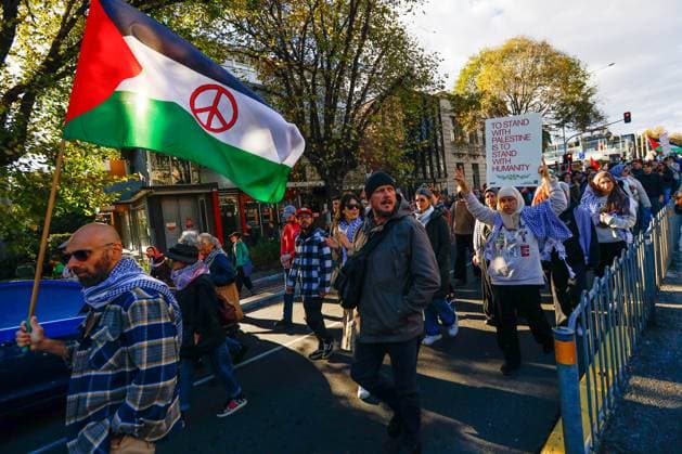 May 18, 2025, Melbourne, Australia: Protesters march through Melbourne during the Nakba Day rally. A Nakba Day rally in Melbourne marked the 77th anniversary with participants marching approximately 6 kilometres from the State Library to St Kilda Beach. The demonstration included a protest outside the U.S. Consulate, denouncing U.S. support for Israel amid the ongoing conflict in Gaza. The rally expressed solidarity with the Palestinian struggle and called for justice and an end to Israeli occupation. Nakba Day commemorates the 1948 displacement of over 750,000 Palestinians during the creation of the state of Israel. Melbourne Australia - ZUMAs197 20250518_aaa_s197_045 Copyright: xYexMyoxKhantx