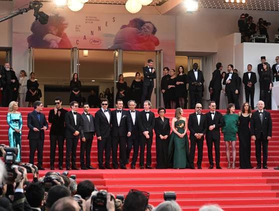 American director Wes Anderson, actors Michael Cera, Benicio Del Toro, Jeffrey Wright, Bill Murray, Italian composer Aleksandre Desplat, British actress Mia Threapleton, actors Rupert Friend, Richard Ayoade, Riz Ahmed and French actress Charlotte Gainsbourg attend the premiere of The Phoenician Scheme at the 78th Cannes Film Festival in Cannes, France on Sunday May 18, 2025. CAN20250518188 RUNExHELLESTAD