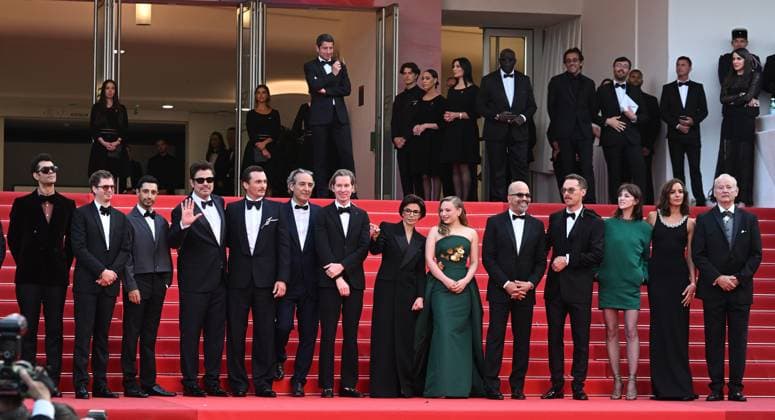 American director Wes Anderson, actors Michael Cera, Benicio Del Toro, Jeffrey Wright, Bill Murray, Italian composer Aleksandre Desplat, British actress Mia Threapleton, actors Rupert Friend, Richard Ayoade, Riz Ahmed and French actress Charlotte Gainsbourg attend the premiere of The Phoenician Scheme at the 78th Cannes Film Festival in Cannes, France on Sunday May 18, 2025. CAN20250518190 RUNExHELLESTAD