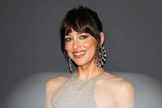 May 18, 2025, Cannes, Cote D azur, France: DAKOTA JOHNSON poses during the Kering Women in Motion Award 2025 photocall in Cannes, France Cannes France - ZUMAc179 20250518_zep_c179_476 Copyright: xMickaelxChavetx