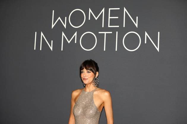 May 18, 2025, Cannes, Cote D azur, France: DAKOTA JOHNSON poses during the Kering Women in Motion Award 2025 photocall in Cannes, France Cannes France - ZUMAc179 20250518_zep_c179_479 Copyright: xMickaelxChavetx