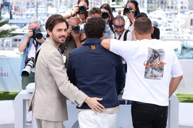 Cannes - Le Roi Soleil Photocall Sofiane Zermani, Pio Marmai, Panayotis Pascot posing during the Le Roi Soleil Photocall at the 78th annual Cannes Film Festival at Palais des Festivals on May 18, 2025 in Cannes, France. Photo by Jerome Domine ABACAPRESS.COM Cannes France  Copyright: xDominexJerome ABACAx