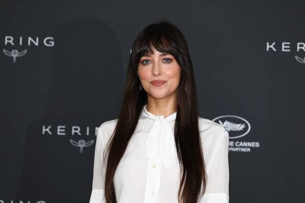 May 19, 2025, Cannes, Cote D azur, France: DAKOTA JOHNSON gives eye contact as she poses during the photocall ahead of ther Kering Women in Motion Talk at the 78th Annual Cannes Film Festival at Palais des Festivals in Cannes, France Cannes France - ZUMAc179 20250519_zep_c179_002 Copyright: xMickaelxChavetx