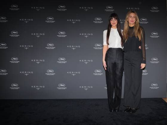 Cannes, Italy: Cannes, 78th Cannes Film Festival 2025 - day 7 - Kering Women in Motion Talk - In the photo: Dakota Johnson, Ro Donnelly Cannes Italy  - ZUMAp169 20250519_zea_p169_064 Copyright: xBarbaraxAmendolax