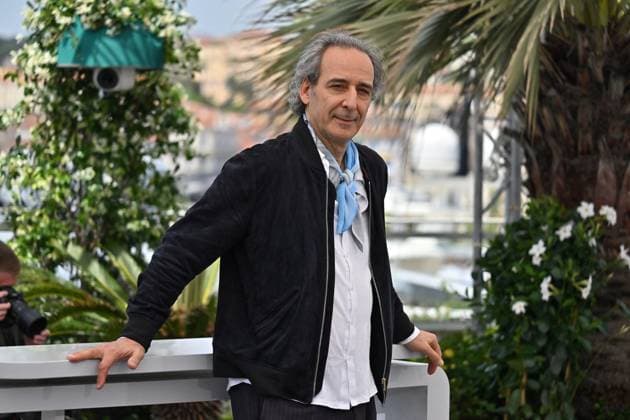 Cannes Photocall The Phoenician Scheme JR Alexandre Desplat attending the photocall of the movie The Phoenician Scheme during 78th Cannes Film Festival in Cannes, France on May, 19, 2025. Photo by Julien Reynaud APS-Medias ABACAPRESS.COM Cannes France  Copyright: xReynaudxJulien APS-Medias ABACAx