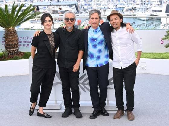 Cannes, France: Cannes, 78th Cannes Film Festival 2025 - day 7 - photocall of the film Magellan. In the photo Ã‚ngela Azevedo, Lav Diaz, Gael Garcia Bernal and Amado Arjay Babon Cannes  - ZUMAp169 20250519_zea_p169_996 Copyright: xAlbertoxTerenghix