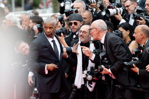 Highest 2 Lowest , Red Carpet in Cannes, 19 05 2025 Cannes, France 19 5 2024 Denzel Washington jokes with photographers during the Highest 2 Lowest Red Carpet during the 78 Cannes International Film Festival The film festival takes place from May 13 to 24, 2025 Cannes Palais des Festivals et des Cong Provence Alpes Cote d Azur France Copyright: xChristianxEnderx