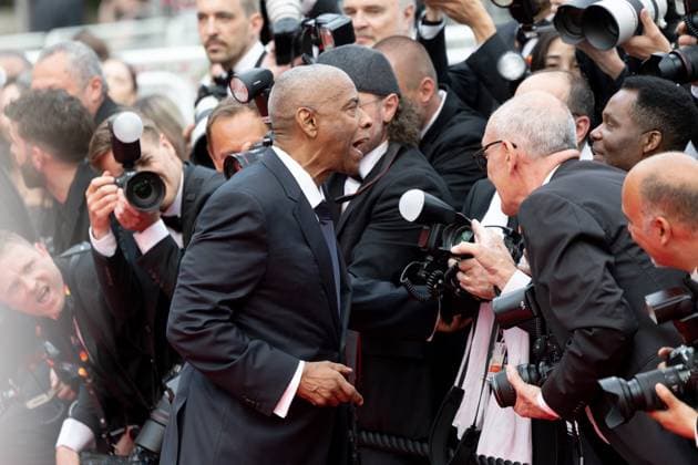 Highest 2 Lowest , Red Carpet in Cannes, 19 05 2025 Cannes, France 19 5 2024 Denzel Washington talks to photographers during the Highest 2 Lowest Red Carpet during the 78 Cannes International Film Festival The film festival takes place from May 13 to 24, 2025 Cannes Palais des Festivals et des Cong Provence Alpes Cote d Azur France Copyright: xChristianxEnderx