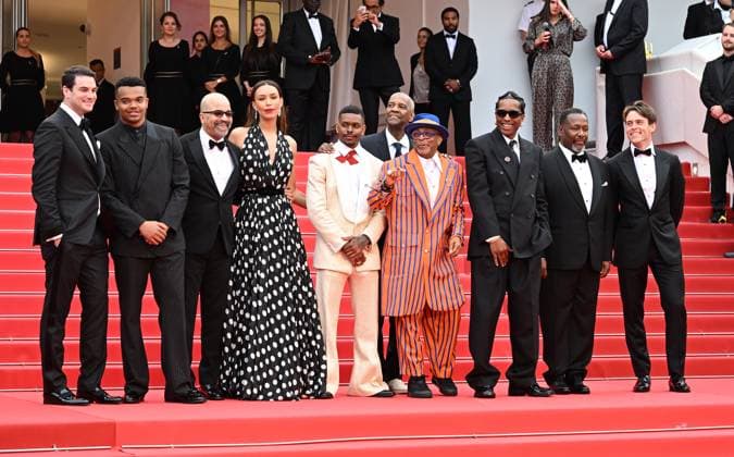 American actress Ilfenesh Hadera, director Spike Lee, actors Denzel Washington, Wendell Pierce, Jeffrey Wright, Aubrey Joseph, Elijah Wright, actor musician Asap Rocky, producers Alan Fox and Jason Berman attend the premiere of Highest 2 Lowest at the 78th Cannes Film Festival in Cannes, France on Monday May 19, 2025. CAN20250519170 RUNExHELLESTAD